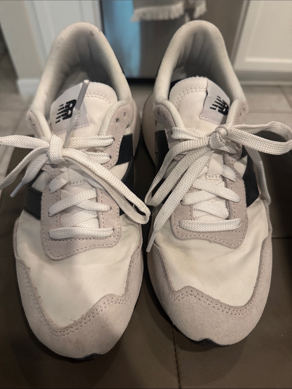 New Balance White and Black Athletic Sneakers